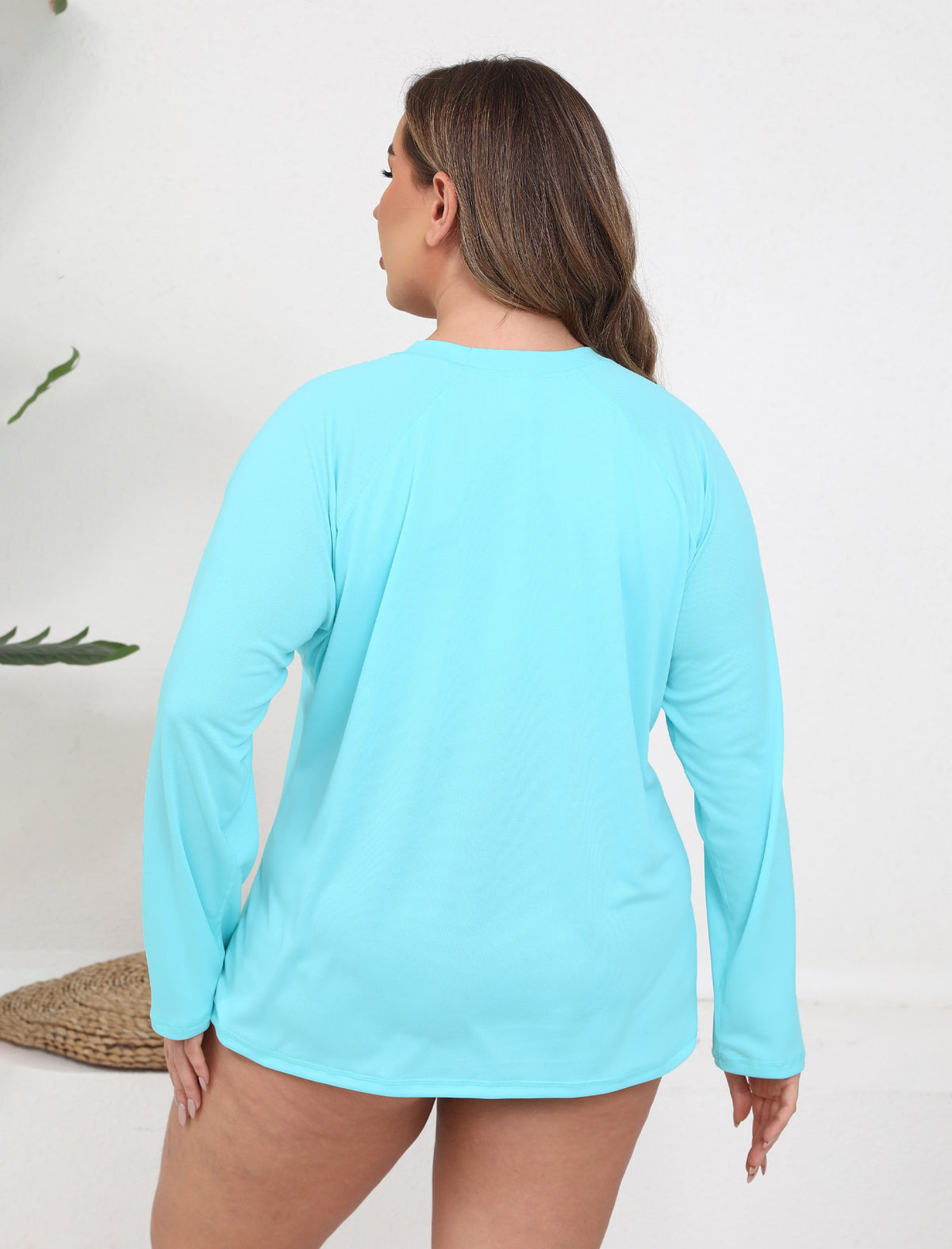 Maillot de bain une pièce à manches longues Halcurt pour femme, idéal pour le surf.